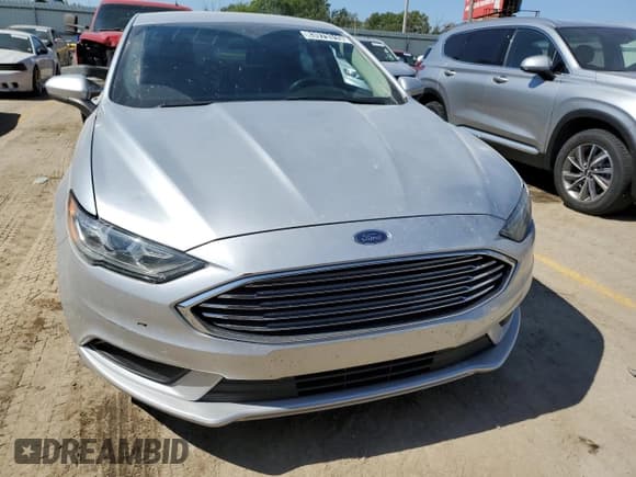 ✅ 2018 Ford Fusion SE • VIN: 3FA6P0H72JR194660 • Lot: 83979315. Wystawiony na Copart z przebiegiem 151 488 mil. Bezpłatny archiwum sprzedaży aukcyjnych z USA i szczegółowy raport historii pojazdu na DreamBid. Zdjęcie 5.