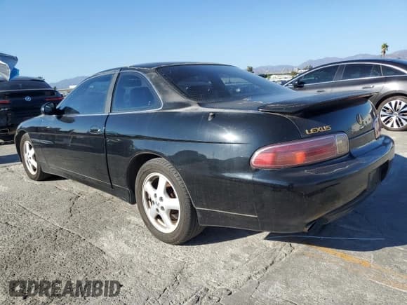 ✅ 2000 Lexus SC 300 • VIN: JT8CD32Z2Y1006739 • Лот: 82007855. Опубликован ранее на Copart с пробегом 207 380 миль. Бесплатный доступ к архиву аукционных продаж из США и подробный отчёт об истории автомобиля на DreamBid. Изображение 2.