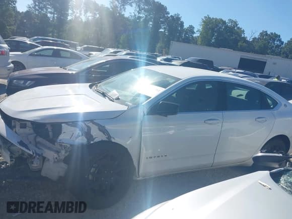 ✅ 2017 Chevrolet Impala LS • VIN: 2G11X5SAXH9156060 • Lot: 43067502. Listed on IAAI with 247,452 mi. Free auction sales archive from the USA and detailed vehicle history report at DreamBid. Image 15.