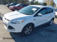 ✅ 2013 Ford Escape SE • VIN: 1FMCU9GX9DUC87292 • Lot: 43837293. Listed on IAAI with 140,103 mi. Free auction sales archive from the USA and detailed vehicle history report at DreamBid. Image 2.