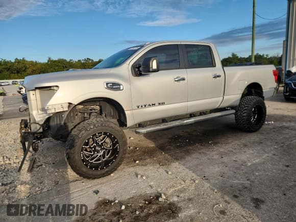 ✅ 2017 Nissan Titan SV • VIN: 1N6BA1F32HN532018 • Lot: 91584795. Listed on Copart with 65,509 mi. Free auction sales archive from the USA and detailed vehicle history report at DreamBid. Image 1.