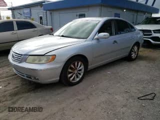 ✅ 2007 Hyundai Azera SE • VIN: KMHFC46F07A242937 • Lot: 85093875. Listed on Copart with 118,060 mi. Free auction sales archive from the USA and detailed vehicle history report at DreamBid. Image 1.