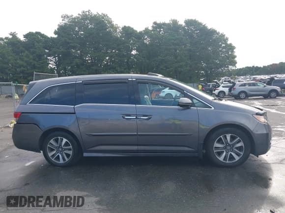 ✅ 2015 Honda Odyssey Touring Elite • VIN: 5FNRL5H9XFB041101 • Лот: 43063363. Опубликован ранее на IAAI с пробегом 162 011 миль. Бесплатный доступ к архиву аукционных продаж из США и подробный отчёт об истории автомобиля на DreamBid. Изображение 13.