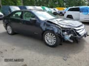 ✅ 2010 Ford Fusion Hybrid • VIN: 3FADP0L39AR132720 • Lot: 60750315. Listed on Copart with 120,264 mi. Free auction sales archive from the USA and detailed vehicle history report at DreamBid. Image 4.