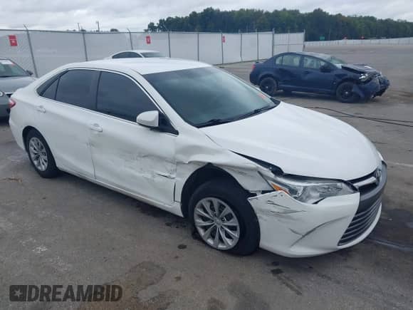 2015 Toyota Camry LE with VIN 4T4BF1FKXFR516407, listed as a IAAI auction lot 43385667 with 52,160 mi miles and . Bid and sale history available at DreamBid. Image 1.