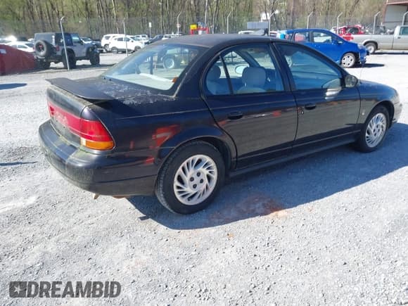 ✅ 1999 Saturn SL • VIN: 1G8ZK5274XZ333729 • Lot: 41987885. Wystawiony na IAAI z przebiegiem Nie podano. Bezpłatny archiwum sprzedaży aukcyjnych z USA i szczegółowy raport historii pojazdu na DreamBid. Zdjęcie 4.