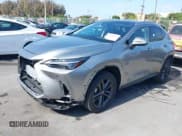 ✅ 2025 Lexus NX 450h+ Luxury • VIN: JTJHKCFZ2S2044140 • Lot: 42189367. Listed on IAAI with 1,955 mi. Free auction sales archive from the USA and detailed vehicle history report at DreamBid. Image 2.