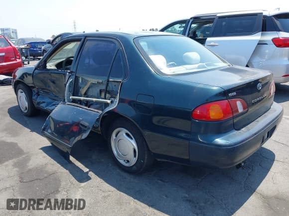 ✅ 1999 Toyota Corolla VE • VIN: 1NXBR12E4XZ251809 • Lot: 42910359. Listed on IAAI with 150,200 mi. Free auction sales archive from the USA and detailed vehicle history report at DreamBid. Image 3.