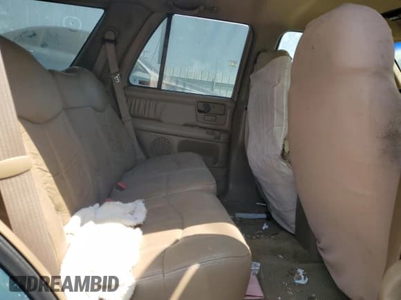 ✅ 1996 GMC Jimmy SL • VIN: 1GKDT13W8T2562644 • Лот: 61973555. Опубликован ранее на Copart с пробегом 164 511 миль. Бесплатный доступ к архиву аукционных продаж из США и подробный отчёт об истории автомобиля на DreamBid. Изображение 11.