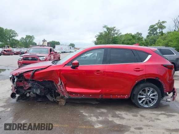 ✅ 2024 Mazda CX-5 S Premium Plus • VIN: JM3KFBELXR0530129 • Лот: 42290414. Опубликован ранее на IAAI с пробегом 5 474 миль. Бесплатный доступ к архиву аукционных продаж из США и подробный отчёт об истории автомобиля на DreamBid. Изображение 13.