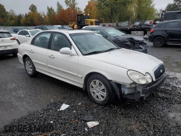 2002 Hyundai Sonata with VIN KMHWF25S02A673104, listed as a Copart auction lot 75429284 with 101,568 mi miles and Salvage title. Bid and sale history available at DreamBid. Image 4.