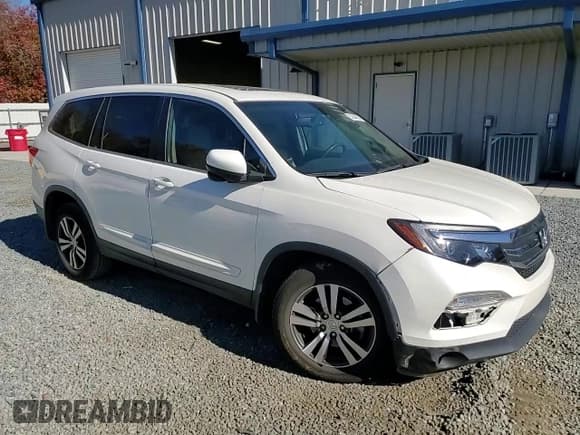 ✅ 2018 Honda Pilot EX-L • VIN: 5FNYF5H59JB002069 • Lot: 93284955. Listed on Copart with 93,923 mi. Free auction sales archive from the USA and detailed vehicle history report at DreamBid. Image 14.