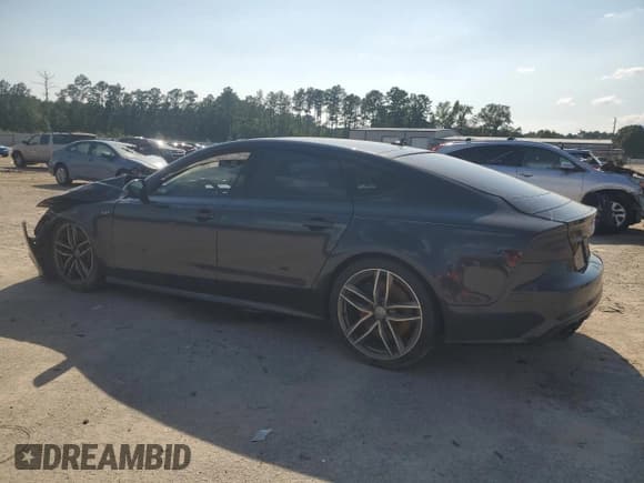 ✅ 2016 Audi S7 • VIN: WAUW2AFC7GN079947 • Лот: 65709985. Опубликован ранее на Copart с пробегом 104 064 миль. Бесплатный доступ к архиву аукционных продаж из США и подробный отчёт об истории автомобиля на DreamBid. Изображение 2.