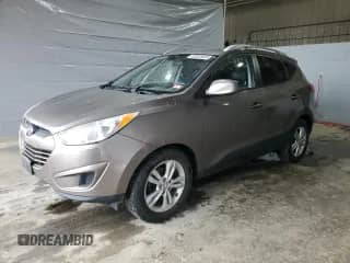 2011 Hyundai Tucson Limited with VIN KM8JUCAC0BU279329, listed as a Copart auction lot 53232635 with 130,533 mi miles and Salvage title. Bid and sale history available at DreamBid. Image 1.