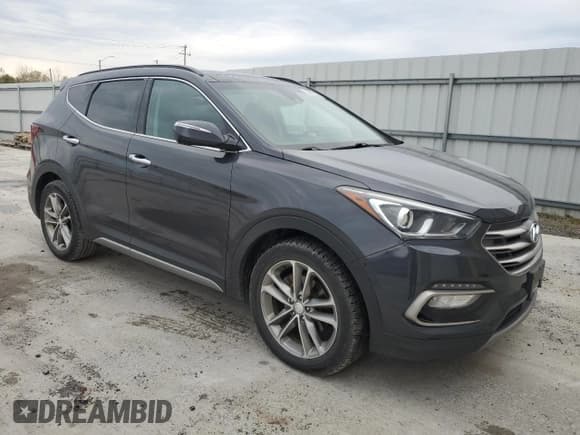 ✅ 2017 Hyundai Santa Fe 2.0T • VIN: 5XYZUDLA1HG495970 • Lot: 92159705. Listed on Copart with 68,332 mi. Free auction sales archive from the USA and detailed vehicle history report at DreamBid. Image 4.