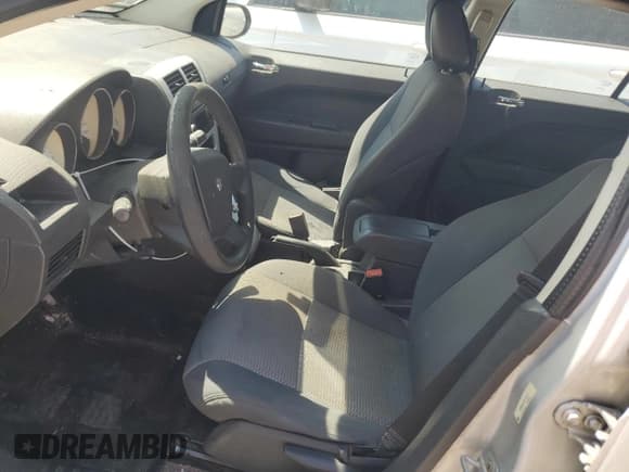 ✅ 2009 Dodge Caliber SXT • VIN: 1B3HB48A79D165679 • Лот: 69765994. Опубликован ранее на Copart с пробегом 191 179 миль. Бесплатный доступ к архиву аукционных продаж из США и подробный отчёт об истории автомобиля на DreamBid. Изображение 7.