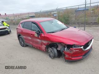 ✅ 2021 Mazda CX-5 Touring • VIN: JM3KFBCM4M0437448 • Lot: 43560635. Wystawiony na IAAI z przebiegiem 41 044 mil. Bezpłatny archiwum sprzedaży aukcyjnych z USA i szczegółowy raport historii pojazdu na DreamBid. Zdjęcie 1.