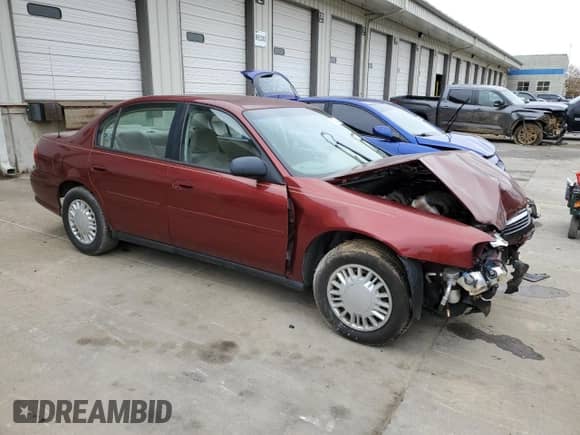 2003 Chevrolet Malibu with VIN 1G1ND52J13M696712, listed as a Copart auction lot 86052984 with 81,635 mi miles and Salvage title. Bid and sale history available at DreamBid. Image 4.