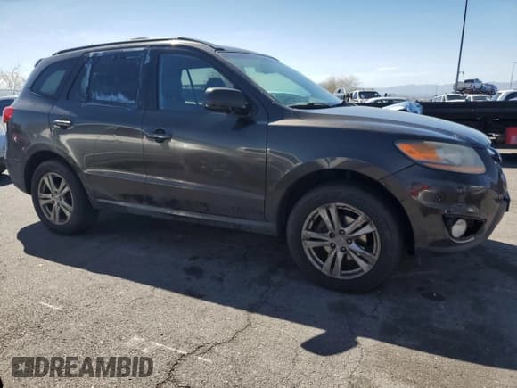 ✅ 2011 Hyundai Santa Fe Limited • VIN: 5XYZHDAG6BG033407 • Lot: 44275095. Listed on Copart with 162,090 mi. Free auction sales archive from the USA and detailed vehicle history report at DreamBid. Image 4.