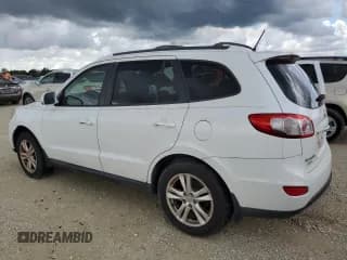 ✅ 2012 Hyundai Santa Fe Limited • VIN: 5XYZK4AG5CG139527 • Lot: 73944854. Listed on Copart with Not provided. Free auction sales archive from the USA and detailed vehicle history report at DreamBid. Image 2.
