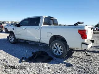 ✅ 2021 Nissan Titan Pro-4X • VIN: 1N6AA1FB6MN516661 • Lot: 92185205. Wystawiony na Copart z przebiegiem 77 482 mil. Bezpłatny archiwum sprzedaży aukcyjnych z USA i szczegółowy raport historii pojazdu na DreamBid. Zdjęcie 2.