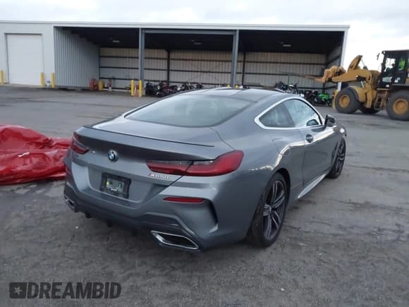 ✅ 2022 BMW 8 Series M850i xDrive • VIN: WBABC4C06NCJ55156 • Лот: 42953080. Опубликован ранее на IAAI с пробегом 20 258 миль. Бесплатный доступ к архиву аукционных продаж из США и подробный отчёт об истории автомобиля на DreamBid. Изображение 4.
