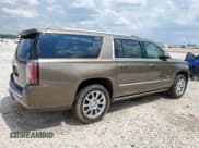 ✅ 2015 GMC Yukon XL Denali • VIN: 1GKS1JKJ2FR731300 • Lot: 67757055. Listed on Copart with 209,048 mi. Free auction sales archive from the USA and detailed vehicle history report at DreamBid. Image 3.