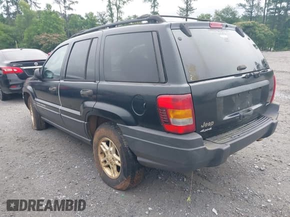 ✅ 2004 Jeep Grand Cherokee Laredo • VIN: 1J4GW48S54C185574 • Lot: 42371493. Listed on IAAI with 227,697 mi. Free auction sales archive from the USA and detailed vehicle history report at DreamBid. Image 3.