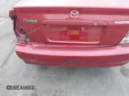 ✅ 2002 Mazda Protege DX • VIN: JM1BJ225821586258 • Lot: 42366064. Wystawiony na IAAI z przebiegiem 167 332 mil. Bezpłatny archiwum sprzedaży aukcyjnych z USA i szczegółowy raport historii pojazdu na DreamBid. Zdjęcie 6.