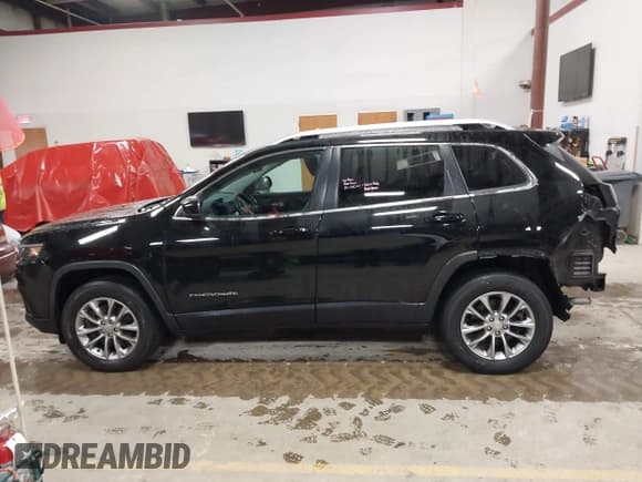 ✅ 2021 Jeep Cherokee 80th Anniversary • VIN: 1C4PJMMX2MD175049 • Lot: 41463634. Listed on IAAI with 82,589 mi. Free auction sales archive from the USA and detailed vehicle history report at DreamBid. Image 15.
