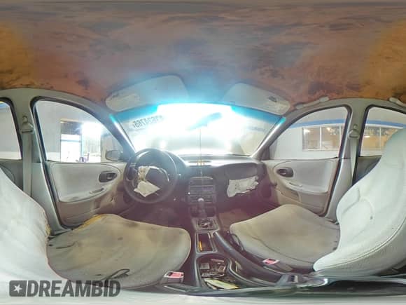 1998 Saturn SL z VIN 1G8ZF5285WZ204569, wystawiony jako Copart lot #43624765 z przebiegiem 318 544 mil mil oraz Szkoda całkowita • Salvage title. Historia ofert i sprzedaży dostępna na DreamBid. Obrazek 12.