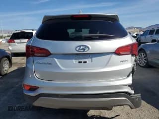 ✅ 2017 Hyundai Santa Fe 2.4L • VIN: 5XYZU3LB4HG492547 • Лот: 48648294. Опубликован ранее на Copart с пробегом 73 440 миль. Бесплатный доступ к архиву аукционных продаж из США и подробный отчёт об истории автомобиля на DreamBid. Изображение 6.