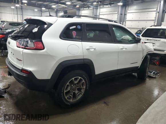 ✅ 2020 Jeep Cherokee Trailhawk • VIN: 1C4PJMBX1LD641281 • Lot: 86532095. Wystawiony na Copart z przebiegiem 56 068 mil. Bezpłatny archiwum sprzedaży aukcyjnych z USA i szczegółowy raport historii pojazdu na DreamBid. Zdjęcie 3.