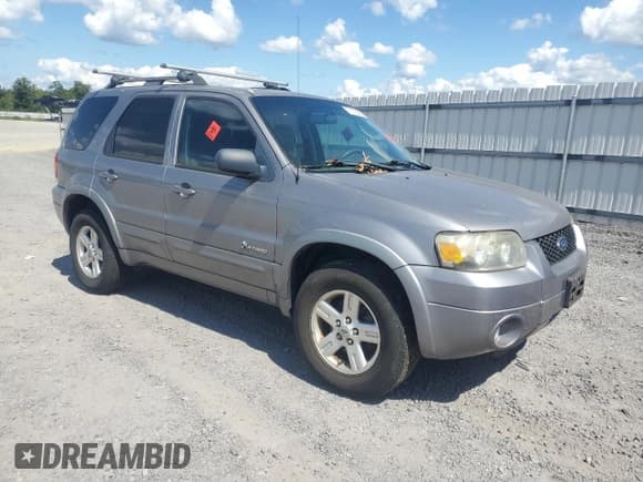 ✅ 2007 Ford Escape Hybrid • VIN: 1FMCU49H07KB60889 • Lot: 71118925. Wystawiony na Copart z przebiegiem 99 990 mil. Bezpłatny archiwum sprzedaży aukcyjnych z USA i szczegółowy raport historii pojazdu na DreamBid. Zdjęcie 4.