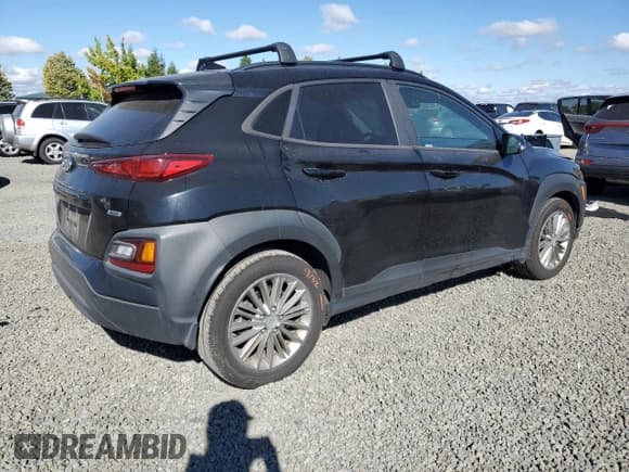 ✅ 2019 Hyundai Kona SEL • VIN: KM8K6CAA3KU321828 • Лот: 69728744. Опубликован ранее на Copart с пробегом 91 292 миль. Бесплатный доступ к архиву аукционных продаж из США и подробный отчёт об истории автомобиля на DreamBid. Изображение 3.