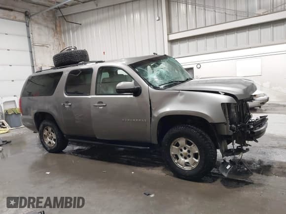 ✅ 2007 Chevrolet Suburban LT • VIN: 1GNFK16367J231735 • Lot: 41324458. Listed on IAAI with 241,822 mi. Free auction sales archive from the USA and detailed vehicle history report at DreamBid. Image 14.