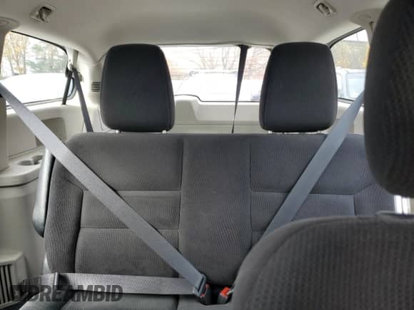 2014 Dodge Grand Caravan SE with VIN 2C4RDGBG0ER453028, listed as a Copart auction lot 90515885 with 179,467 mi miles and Clean title. Bid and sale history available at DreamBid. Image 10.