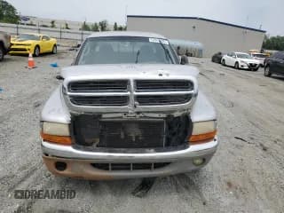 ✅ 2001 Dodge Dakota • VIN: 1B7GL22X01S173048 • Lot: 57018055. Wystawiony na Copart z przebiegiem 163 856 mil. Bezpłatny archiwum sprzedaży aukcyjnych z USA i szczegółowy raport historii pojazdu na DreamBid. Zdjęcie 5.
