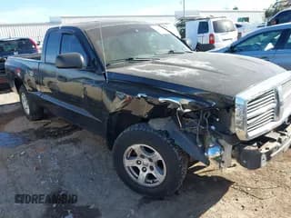 ✅ 2005 Dodge Dakota SLT • VIN: 1D7HE42K55S363423 • Lot: 43680960. Listed on IAAI with 229,912 mi. Free auction sales archive from the USA and detailed vehicle history report at DreamBid. Image 1.