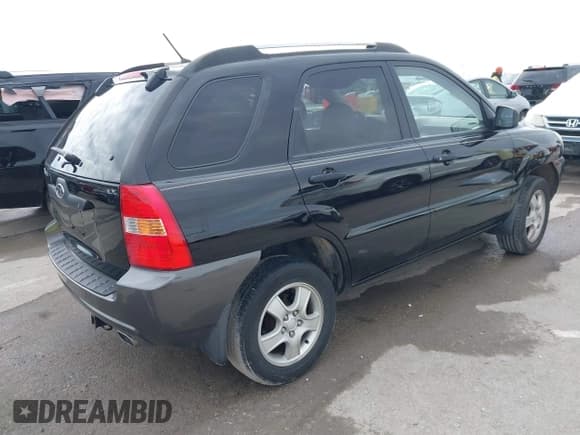 ✅ 2006 Kia Sportage LX • VIN: KNDJF724X67294549 • Lot: 41654020. Listed on IAAI with 158,691 mi. Free auction sales archive from the USA and detailed vehicle history report at DreamBid. Image 4.