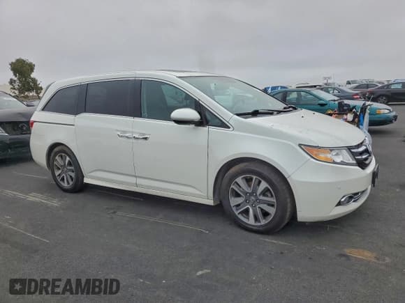 ✅ 2015 Honda Odyssey Touring Elite • VIN: 5FNRL5H94FB038100 • Lot: 95783855. Listed on Copart with 73,187 mi. Free auction sales archive from the USA and detailed vehicle history report at DreamBid. Image 4.