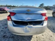 ✅ 2014 Chevrolet Impala LT • VIN: 1G1125S33EU134058 • Lot: 82612225. Listed on Copart with 148,147 mi. Free auction sales archive from the USA and detailed vehicle history report at DreamBid. Image 6.