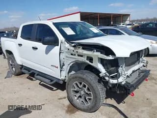 ✅ 2021 GMC Canyon 4WD AT4 • VIN: 1GTG6FEN4M1284091 • Lot: 41840433. Listed on IAAI with 51,202 mi. Free auction sales archive from the USA and detailed vehicle history report at DreamBid. Image 1.