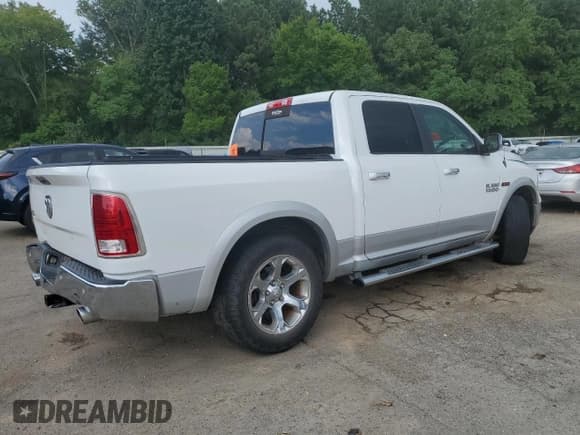 ✅ 2015 Ram 1500 Laramie • VIN: 1C6RR6NM0FS591978 • Lot: 69231665. Wystawiony na Copart z przebiegiem 183 239 mil. Bezpłatny archiwum sprzedaży aukcyjnych z USA i szczegółowy raport historii pojazdu na DreamBid. Zdjęcie 3.