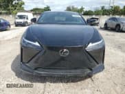 ✅ 2024 Lexus RZ 450e Premium • VIN: JTJAAAAB8RA026440 • Lot: 73634804. Wystawiony na Copart z przebiegiem 1 573 mil. Bezpłatny archiwum sprzedaży aukcyjnych z USA i szczegółowy raport historii pojazdu na DreamBid. Zdjęcie 5.