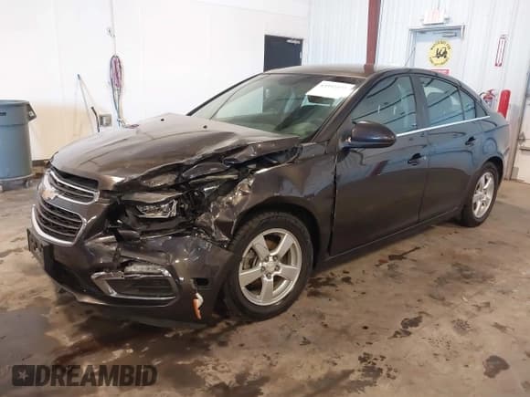 ✅ 2015 Chevrolet Cruze LT • VIN: 1G1PC5SB2F7221576 • Lot: 43392572. Listed on IAAI with 57,665 mi. Free auction sales archive from the USA and detailed vehicle history report at DreamBid. Image 2.