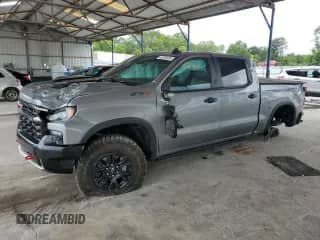 2023 Chevrolet Silverado 1500 ZR2 with VIN 3GCUDHEL0PG159923, listed as a Copart auction lot 60209285 with 23,820 mi miles and Salvage title. Bid and sale history available at DreamBid. Image 1.