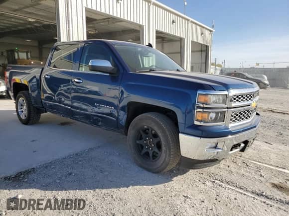 2015 Chevrolet Silverado 1500 LTZ with VIN 3GCUKSEC9FG525833, listed as a Copart auction lot 87082825 with 129,711 mi miles and Salvage title. Bid and sale history available at DreamBid. Image 4.