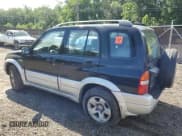 ✅ 1999 Suzuki Grand Vitara JLX • VIN: JS3TD62VXX4100236 • Лот: 57228075. Опубликован ранее на Copart с пробегом Не указан. Бесплатный доступ к архиву аукционных продаж из США и подробный отчёт об истории автомобиля на DreamBid. Изображение 2.