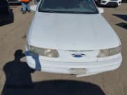 ✅ 1993 Ford Taurus • VIN: 1FACP5748PG130923 • Lot: 43898253. Wystawiony na IAAI z przebiegiem 962 004 mil. Bezpłatny archiwum sprzedaży aukcyjnych z USA i szczegółowy raport historii pojazdu na DreamBid. Zdjęcie 6.